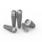 Implants dentaires métalliques sur fond gris.